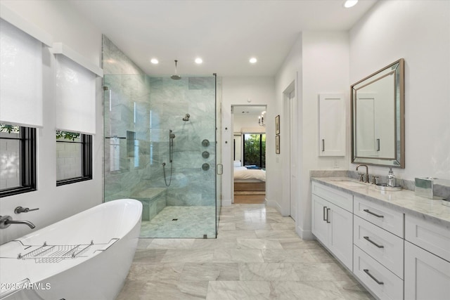 3808 E Fairmount Ave, Phoenix, AZ 85018 - ensuite bathroom with a stall shower, a freestanding tub, vanity, recessed lighting, and marble finish flooring