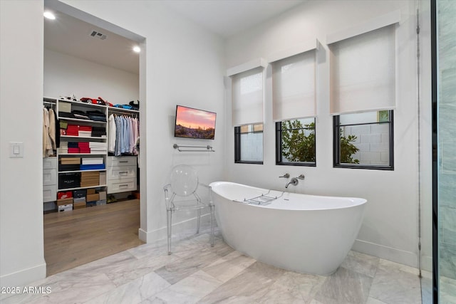 3808 E Fairmount Ave, Phoenix, AZ 85018 - bathroom featuring a walk in closet and a freestanding bath