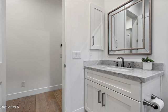 3808 E Fairmount Ave, Phoenix, AZ 85018 - bathroom with wood finished floors and vanity