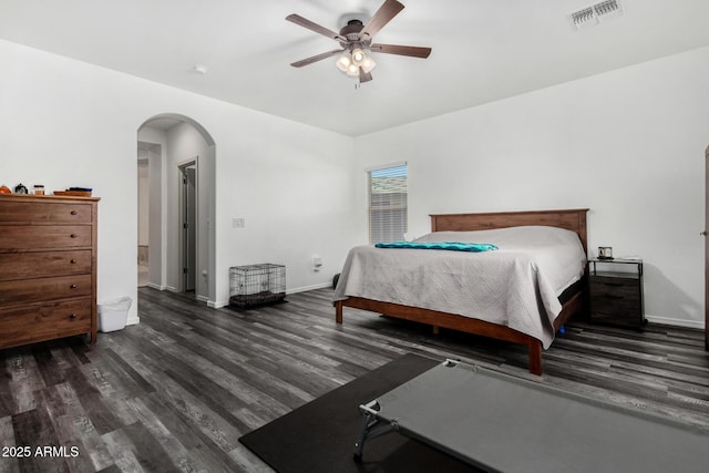 bedroom featuring dark wood-type flooring and ceiling fan