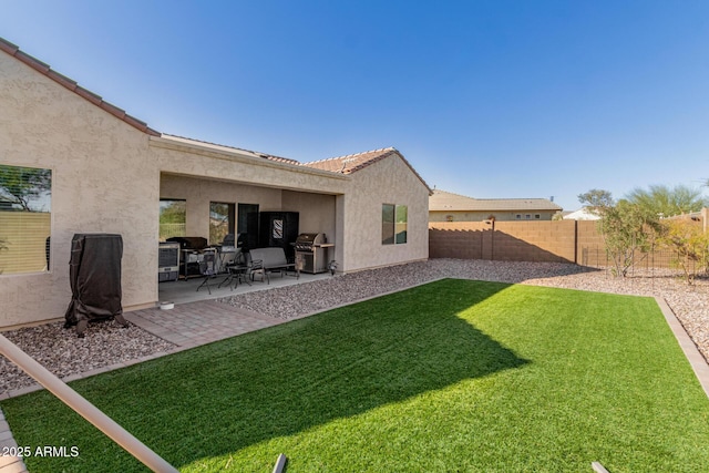 view of yard with a patio area