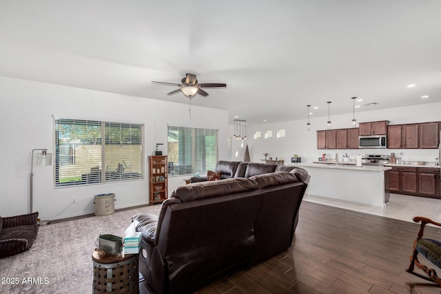 living room featuring ceiling fan