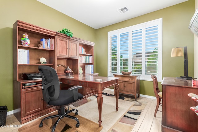 office space featuring light hardwood / wood-style floors