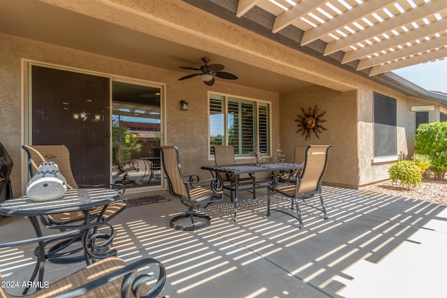 view of patio featuring ceiling fan and a pergola