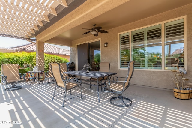 view of patio featuring ceiling fan and a pergola