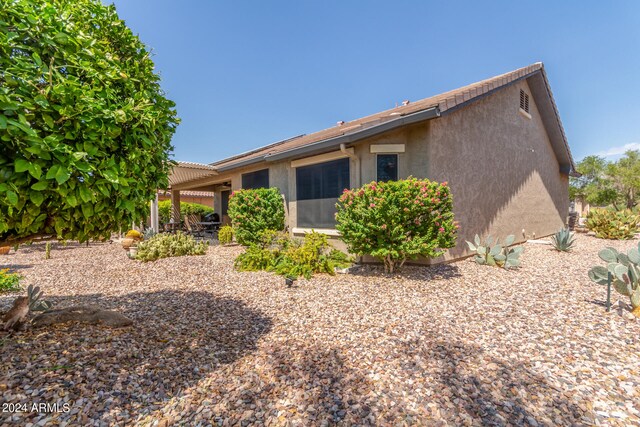 rear view of property with a patio