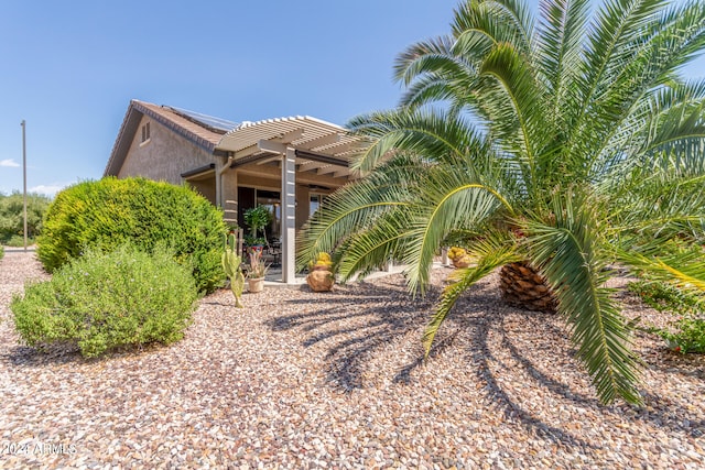 view of front of house featuring a pergola