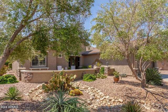 view of front of home with cooling unit