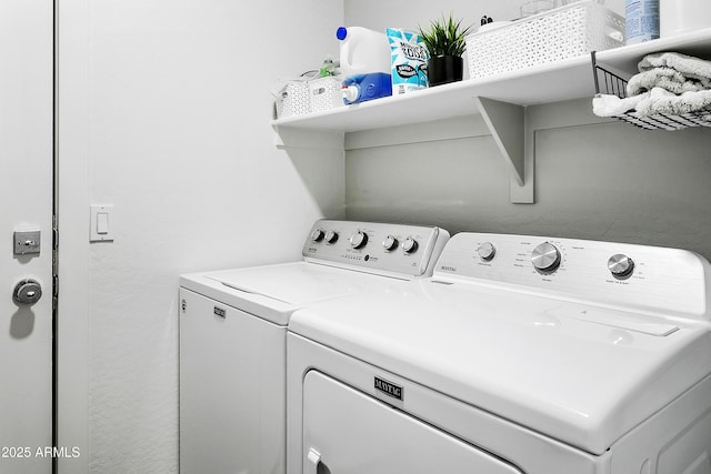 laundry area with laundry area and washing machine and dryer