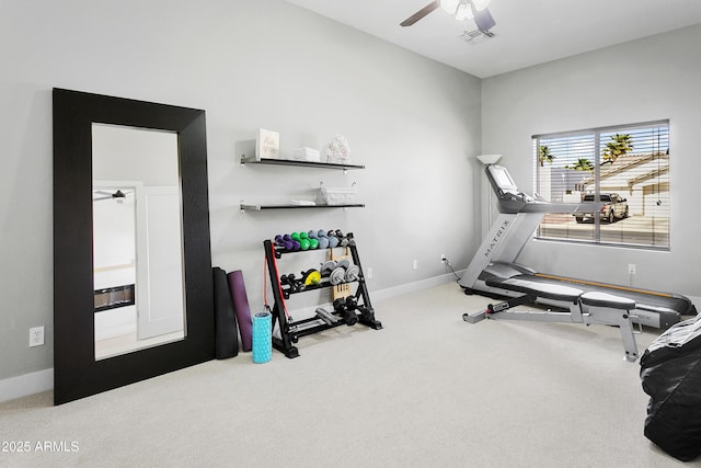 workout area featuring carpet flooring, visible vents, baseboards, and a ceiling fan