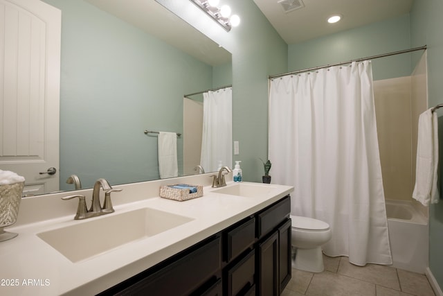 full bathroom featuring tile patterned flooring, shower / bath combo, vanity, and toilet