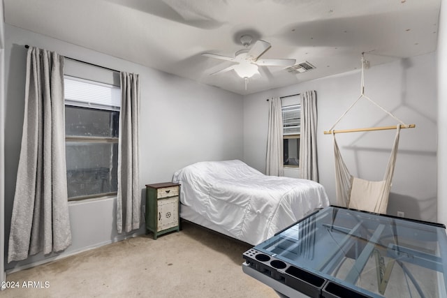 bedroom featuring carpet flooring and ceiling fan