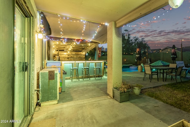 exterior space with an outdoor bar