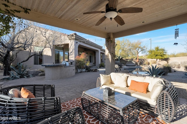 view of patio / terrace featuring an outdoor hangout area and ceiling fan