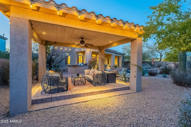 view of patio featuring ceiling fan and outdoor lounge area