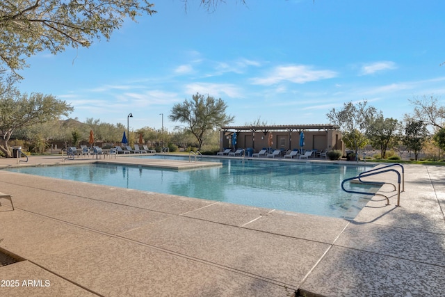 view of pool featuring a pergola and a patio area