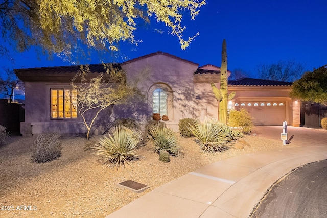 view of front of home with a garage