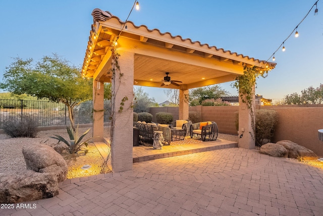 view of patio with ceiling fan