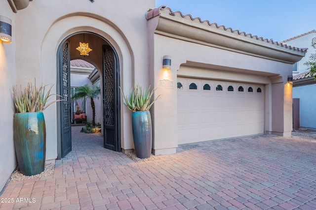 property entrance with a garage