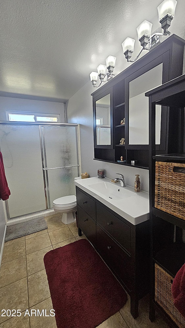 5751 W Muriel Dr, Glendale, AZ 85308 - bathroom featuring a stall shower, vanity, a textured ceiling, tile patterned floors, and a chandelier