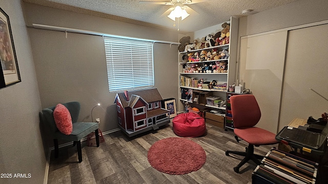 5751 W Muriel Dr, Glendale, AZ 85308 - home office with a textured ceiling, wood finished floors, and a ceiling fan
