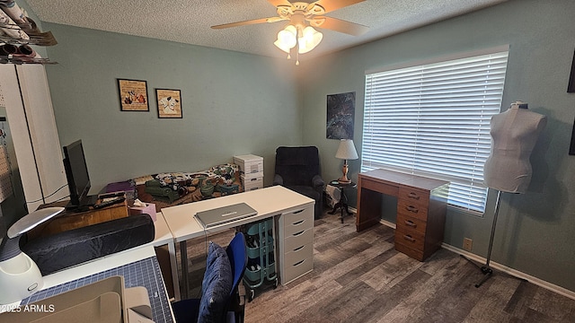 5751 W Muriel Dr, Glendale, AZ 85308 - office area with dark wood finished floors, ceiling fan, and a textured ceiling