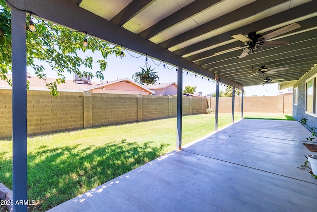 5751 W Muriel Dr, Glendale, AZ 85308 - fenced backyard with a patio area and ceiling fan