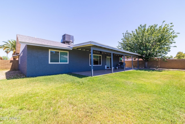 5751 W Muriel Dr, Glendale, AZ 85308 - rear view of property featuring a fenced backyard, a patio, and stucco siding