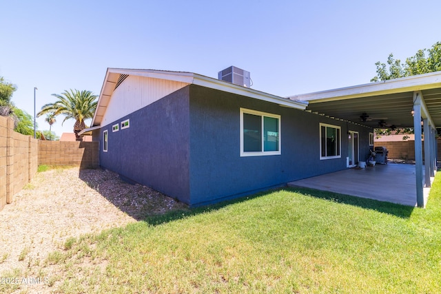 5751 W Muriel Dr, Glendale, AZ 85308 - view of property exterior with a fenced backyard, ceiling fan, and a patio area