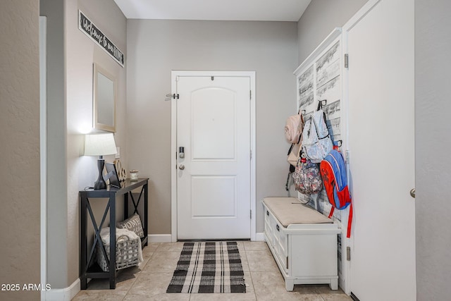 mudroom with light tile patterned floors