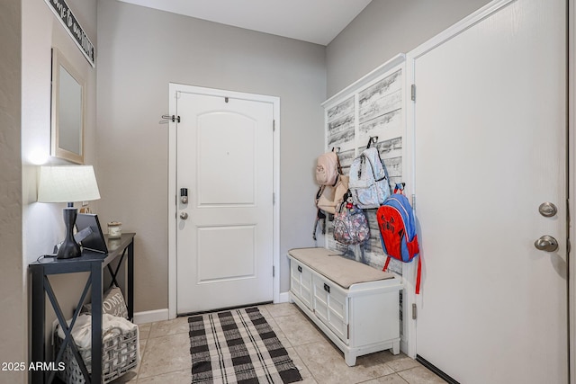 mudroom with light tile patterned floors