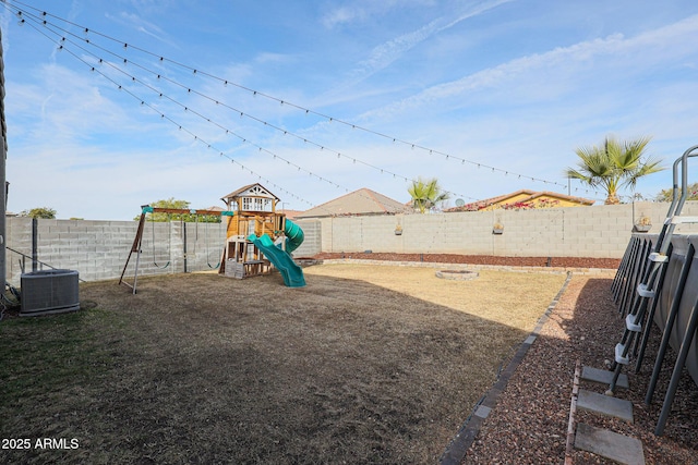 view of jungle gym with central AC unit