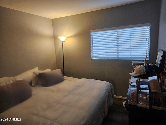 bedroom featuring hardwood / wood-style floors