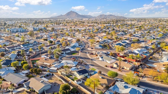 birds eye view of property featuring a residential view and a mountain view