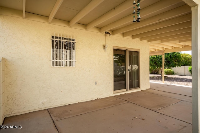view of patio featuring fence
