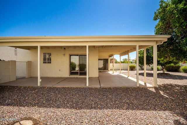 view of patio featuring a pergola and an outdoor stone fireplace