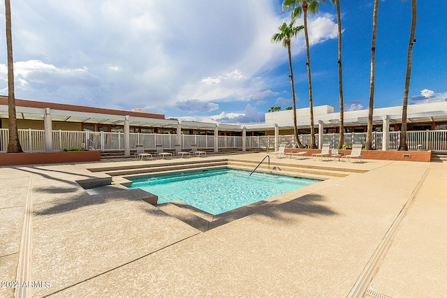 view of pool featuring a patio area