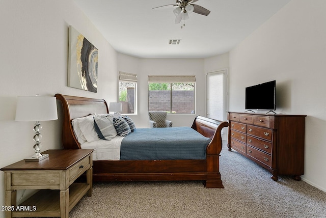 3026 W Silver Fox Way, Phoenix, AZ 85045 - bedroom with light carpet and ceiling fan