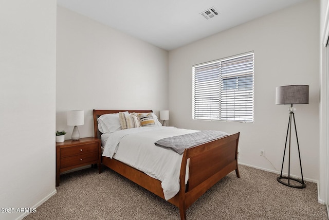 3026 W Silver Fox Way, Phoenix, AZ 85045 - bedroom with carpet floors and baseboards