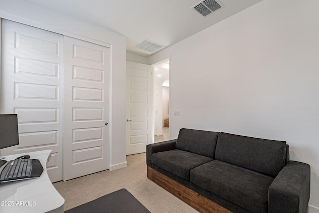 home office featuring light colored carpet and visible vents