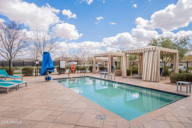 pool featuring fence, a pergola, and a patio