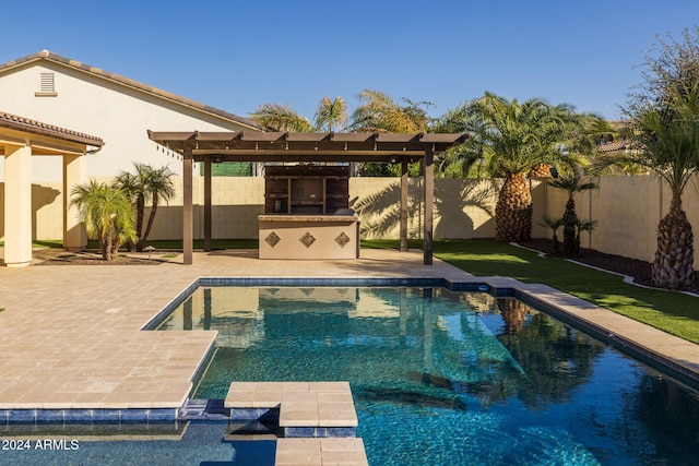 view of pool with a bar, a pergola, and a patio