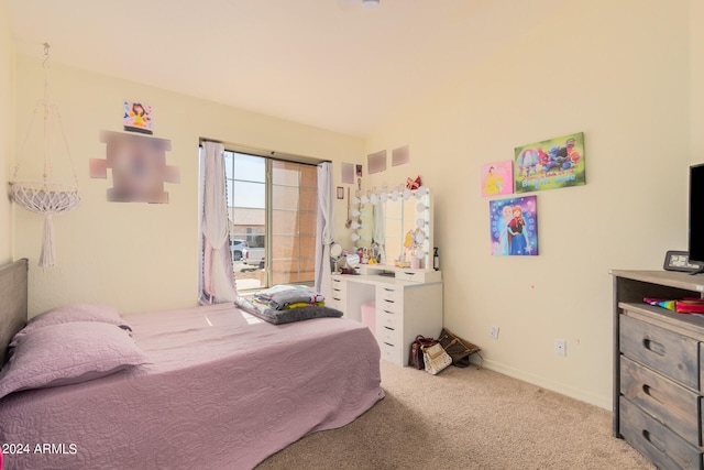 bedroom featuring light carpet