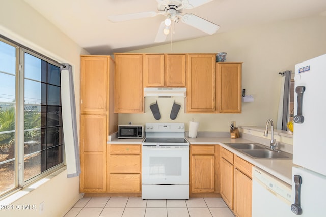 kitchen featuring ceiling fan, light tile patterned flooring, sink, white appliances, and vaulted ceiling