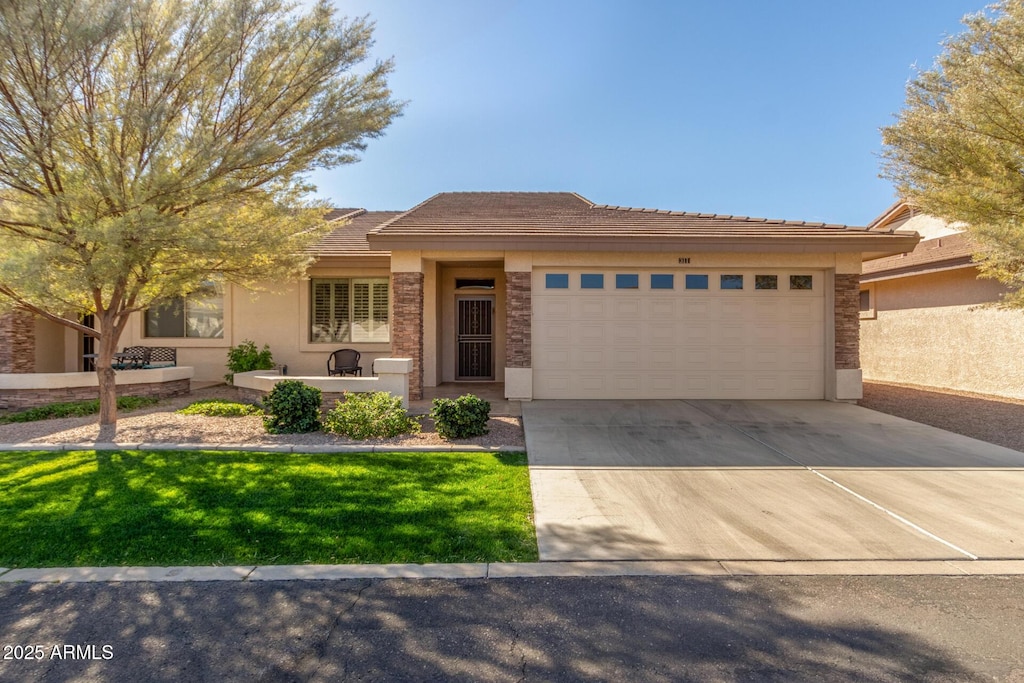 prairie-style home with a garage