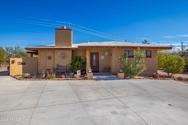 view of front of house with a patio