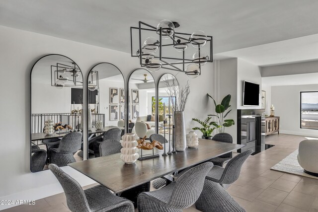 3800 E Lincoln Dr Unit 42, Phoenix, AZ 85018 - dining space with plenty of natural light and a chandelier