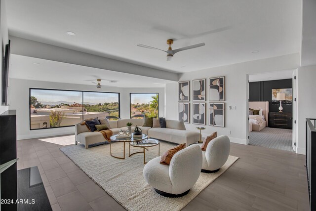 3800 E Lincoln Dr Unit 42, Phoenix, AZ 85018 - living room featuring ceiling fan, recessed lighting, and baseboards