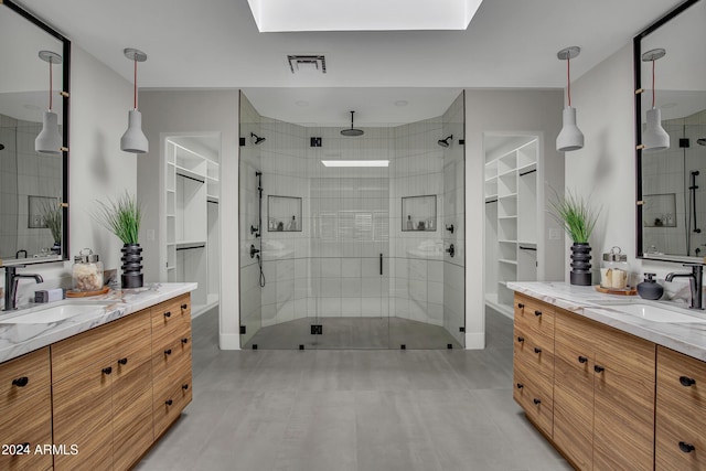 3800 E Lincoln Dr Unit 42, Phoenix, AZ 85018 - bathroom featuring a stall shower and two vanities