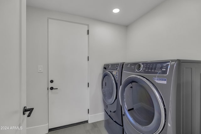 3800 E Lincoln Dr Unit 42, Phoenix, AZ 85018 - laundry area featuring washer and dryer, recessed lighting, and baseboards